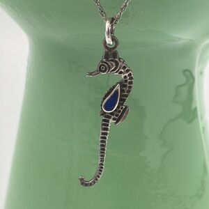 Fresh little sterling silver seahorse necklace with a lapis belly